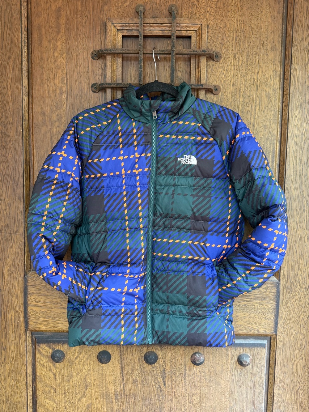 The North Face teen’s Blue, Green & Yellow Plaid Puffer Jacket